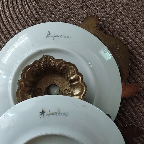 Andreas Zymatikas handpainted porcelain decorative plates, pair