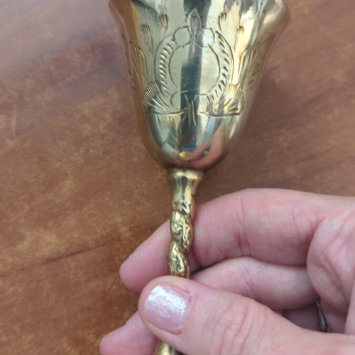 Silver-plated liqueur glasses used with some wear
