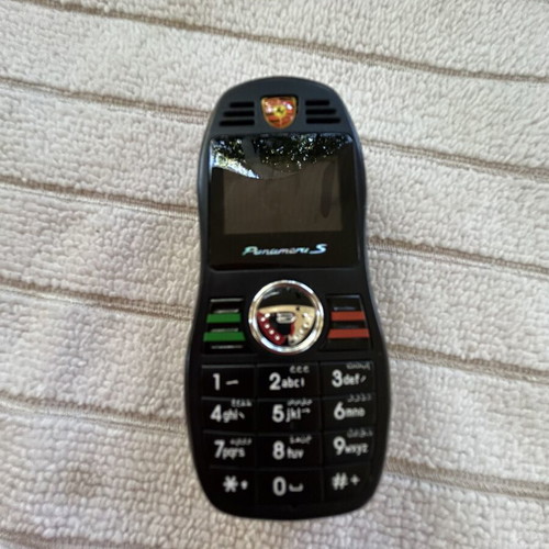 Mini Porsche Panamera Cell Phone like new with Bluetooth and FM radio