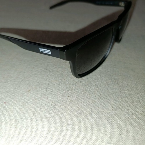 Puma sunglasses like new, black