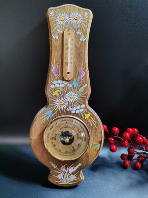 Vintage barometer and thermometer used on wooden base with hand-painted decoration