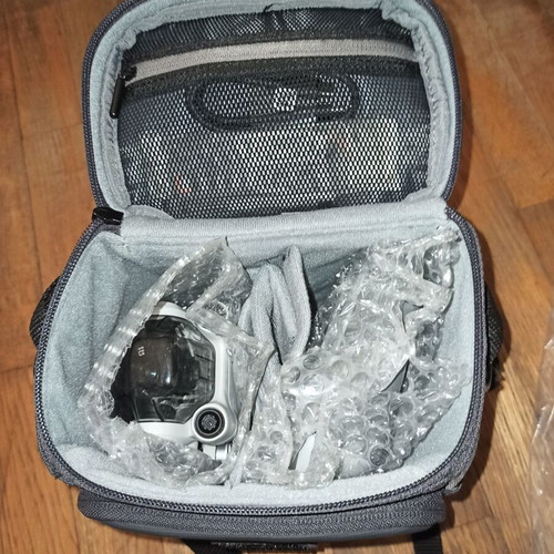 DJI Mini 3 Pro drone with two controllers and accessories