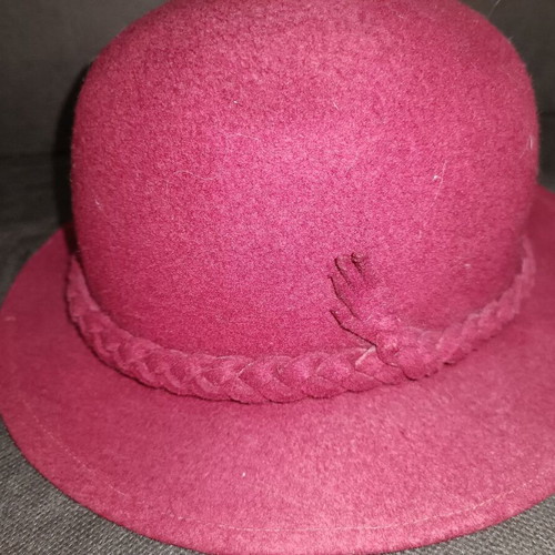 Woolen women's hat burgundy used with braid on brim from 1982