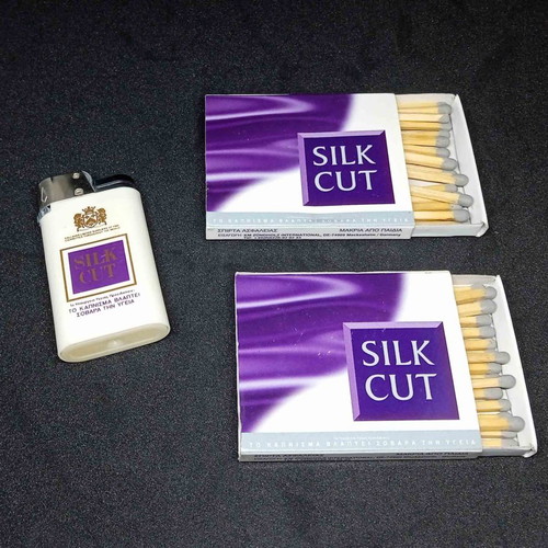 Silk Cut pack used with pen, matches and lighter