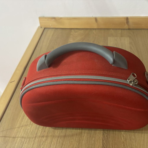 Travel case like new, red with multiple compartments and strap