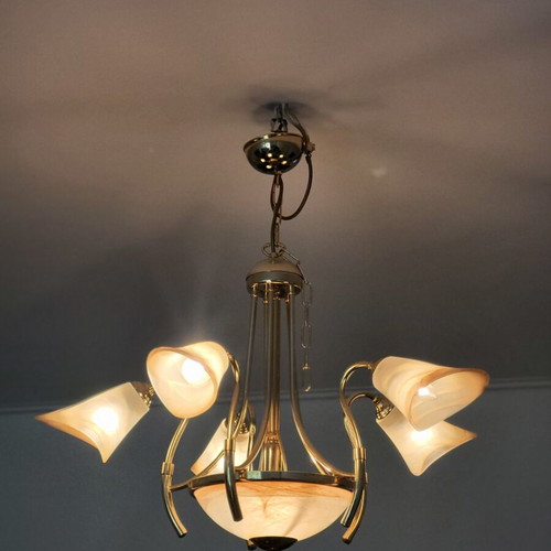 Ceiling chandelier used with handmade glass and bronze