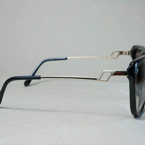 Italian Luxottica 8589 sunglasses used, black and brown