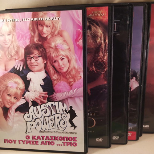 7 assorted DVDs, all together