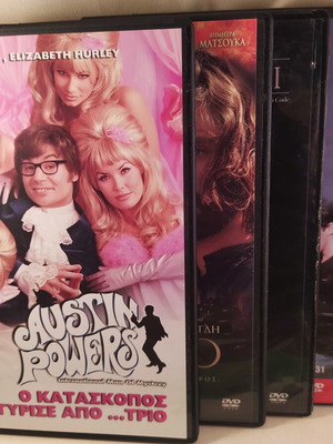 7 assorted DVDs, all together