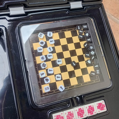 Magnetic games used, set with 15 of 19 pieces