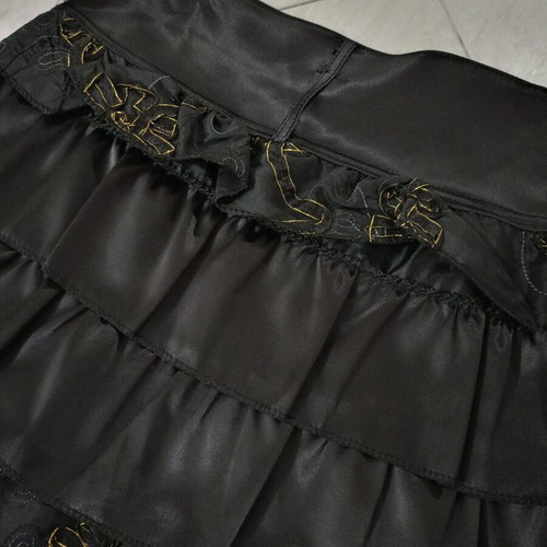 Satin mini skirt black like new with layered ruffles and gold details