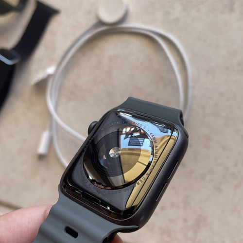 Apple Watch Series 5 44mm with charging cable, straps and screen protectors