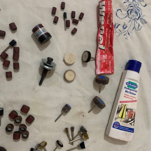 Dremel accessory set used for sanding, cutting, grinding, and polishing