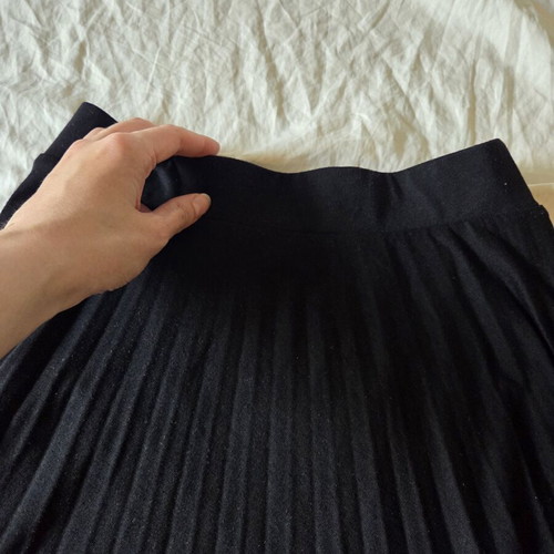 LCW Casual black pleated midi skirt with asymmetrical hem, size S