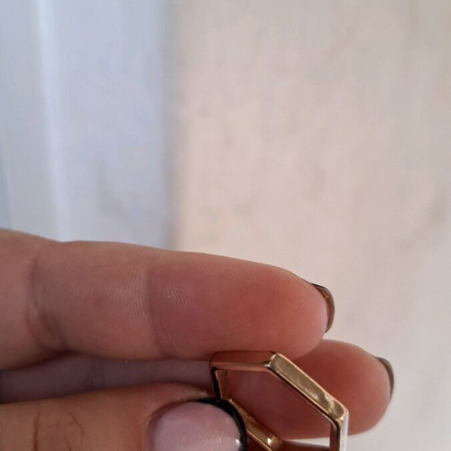Hexagonal women's ring like new, gold color, size 19 or 20