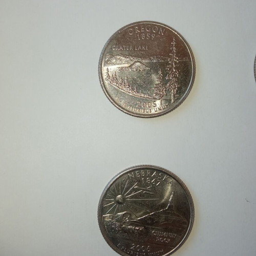 Usa coins used with Oregon, New Hampshire, Nebraska designs