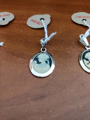 Cameo new with carved young woman figures on onyx