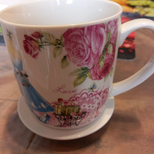 Tea cup used romantic style with saucer