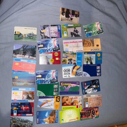 Phone cards and time cards used, collection of 29 from various countries