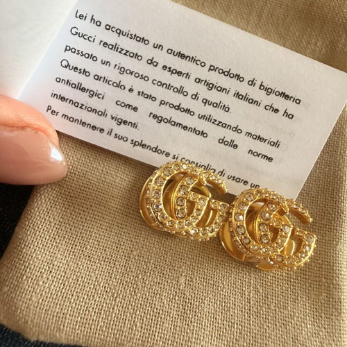 Gucci Double G gold tone earrings 2 in 1