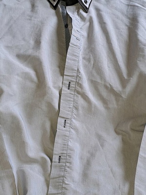 Women's gray shirt XL used with tear on left side