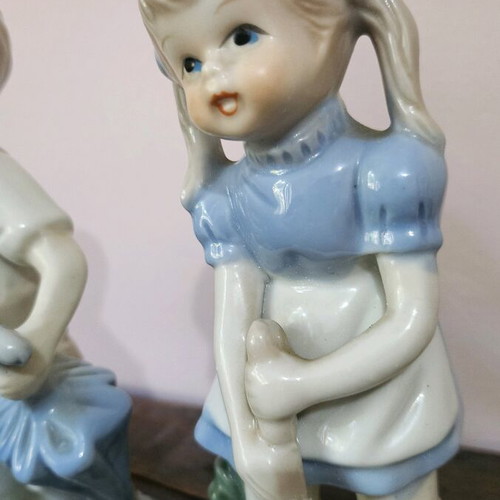 Vintage porcelain figurine set like new, children with umbrellas