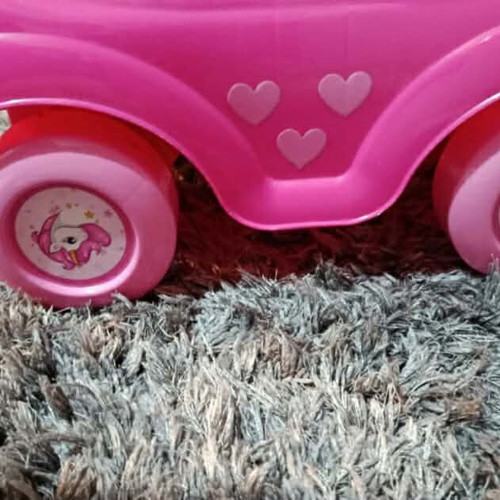 Pink children's toy car used