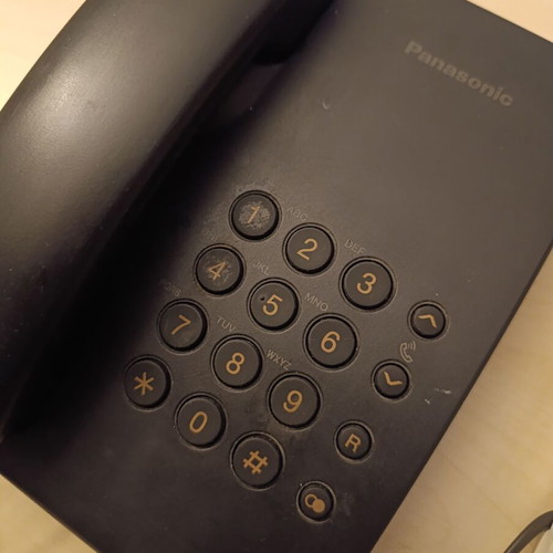 Set of 2 wired Panasonic KX-TS500EXB and Telecom Pronto 20 phones used