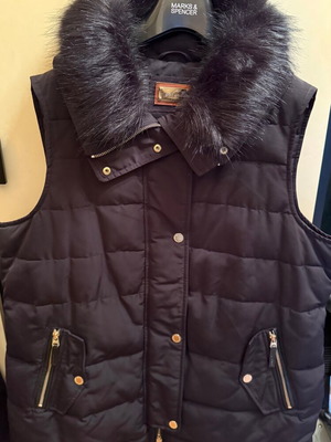 Marks and Spencer sleeveless jacket black like new, size 4XL