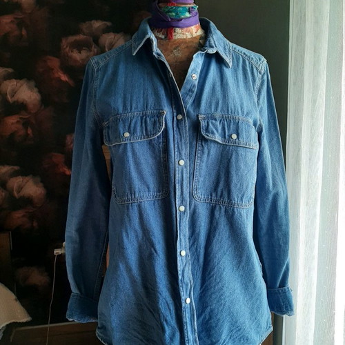 Women's denim shirt with long sleeves used