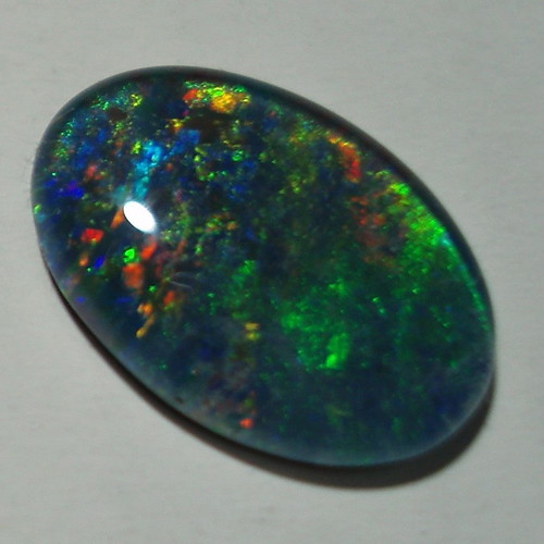 Australlian Opal Doublet 3.340 ct new, size 14x10 mm