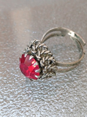 Old ring used, gray with red stone
