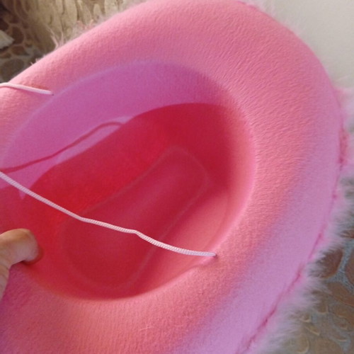 Pink cowboy hat with feathers
