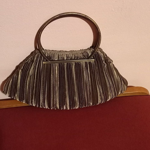 Handbag olive satin with metal details like new