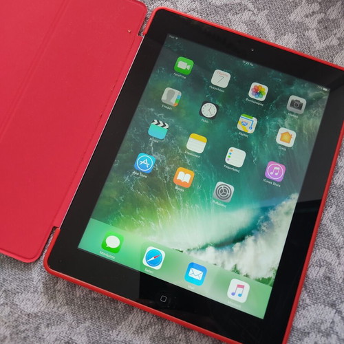 Apple iPad tablet like new, older model with red case