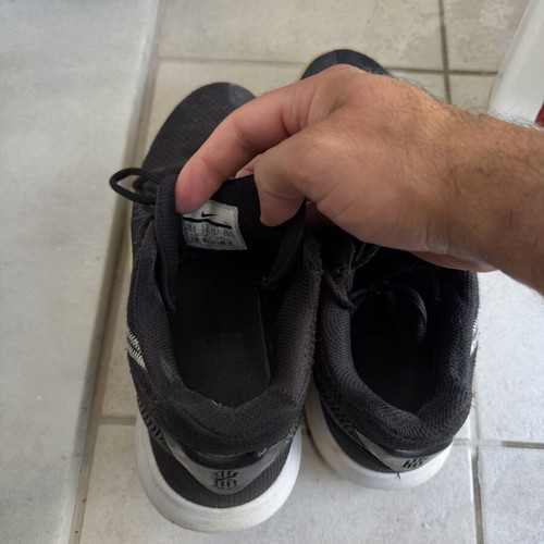 Nike men's athletic shoes size 44.5, black and grey