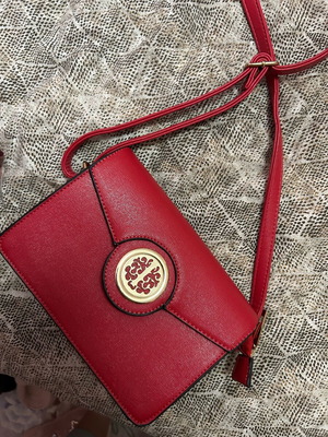 Red crossbody bag in like new condition