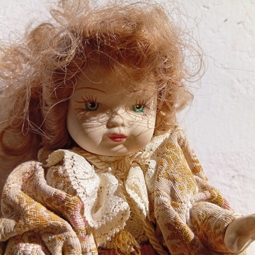Porcelain dolls used, set of two 21 and 18 cm