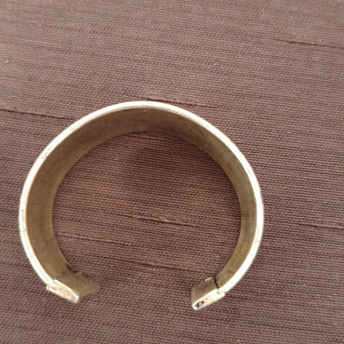 Bracelet wide handmade cuff with embossed ethnic design used, silver finish