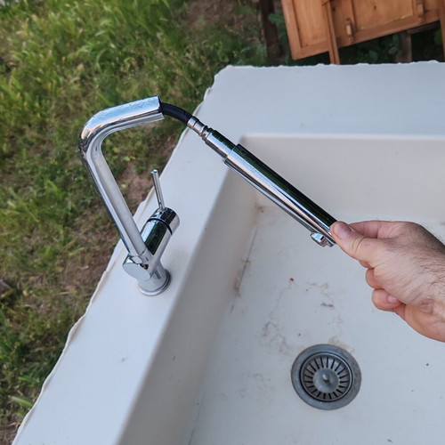 Corian sink with telescopic faucet like new