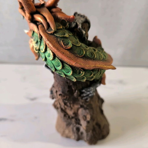 Wooden dragon handmade used with painted details