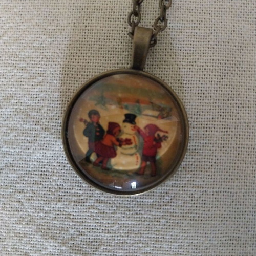 Vintage long necklace with snowman and children, like new