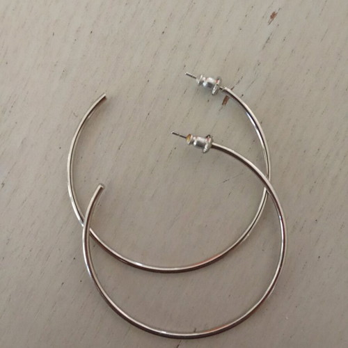 Hoop earrings used, silver color, medium size