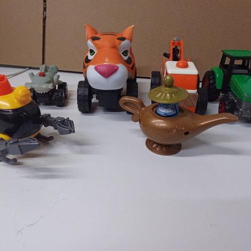 Children's toy set with submarine, cars, tractor, and magic lamp
