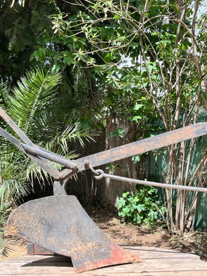 Antique plow used for outdoor decoration