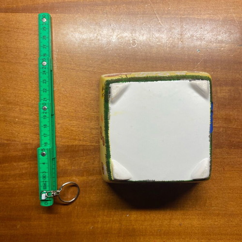 Clay container used with painted design
