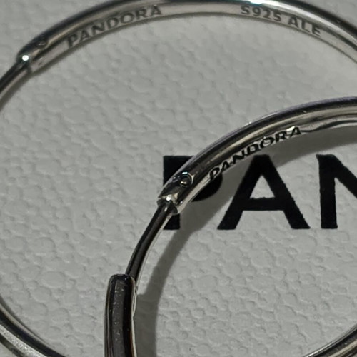 Pandora silver hoop earrings like new with engraved logo