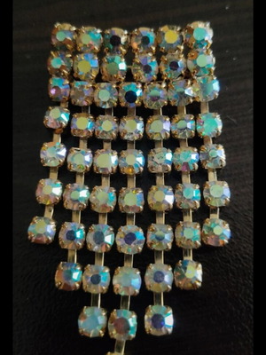 Antique brooch with colorful artificial stones like new