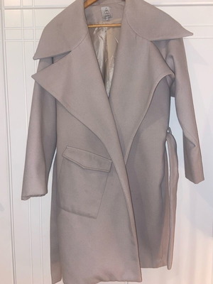 The Knls coat used, size small/medium, warm with belt