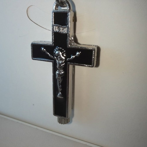 Metal opening cross new with black enamel and adjustable cord